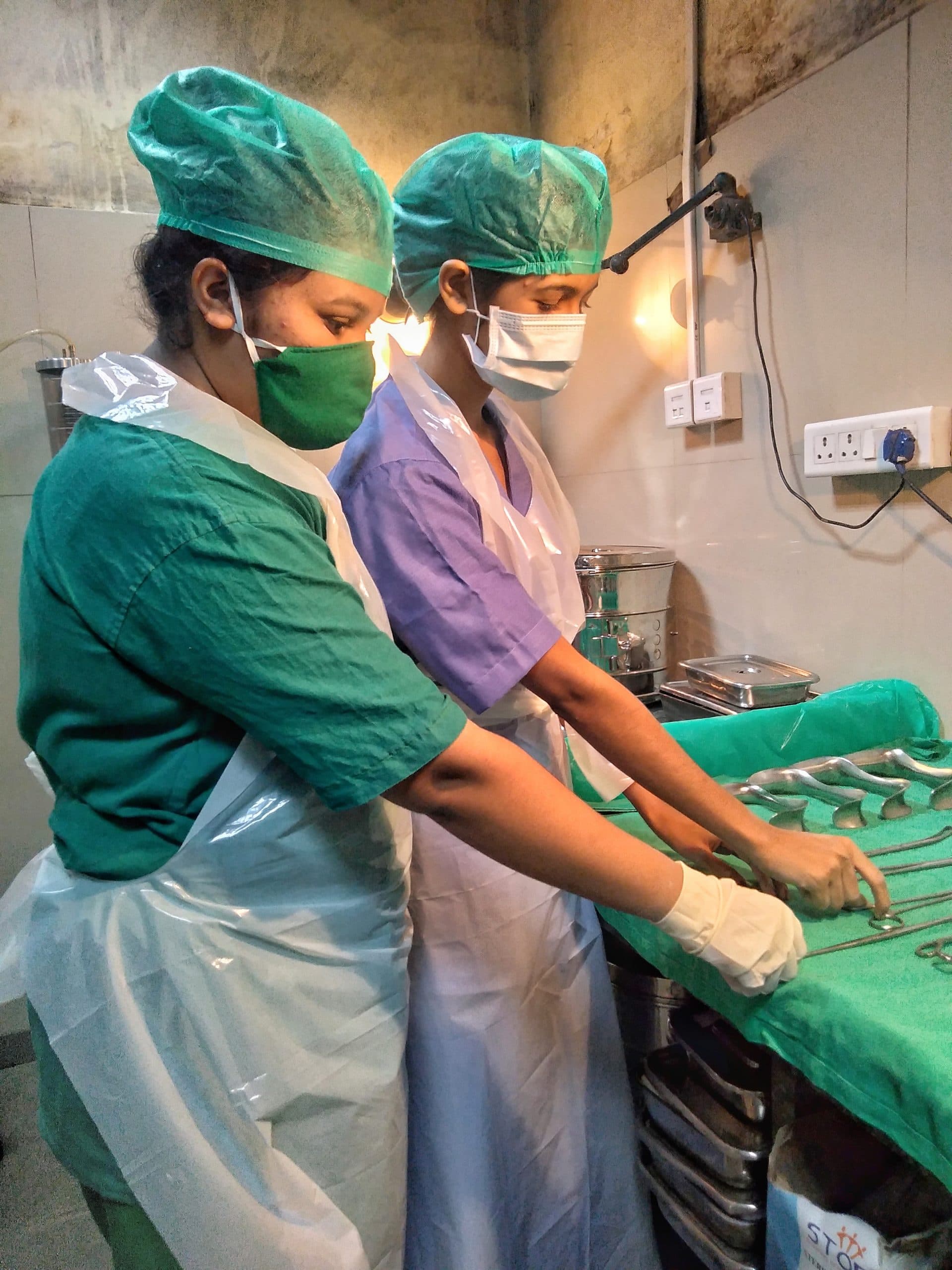 Nursing learners practicing clinical skills together